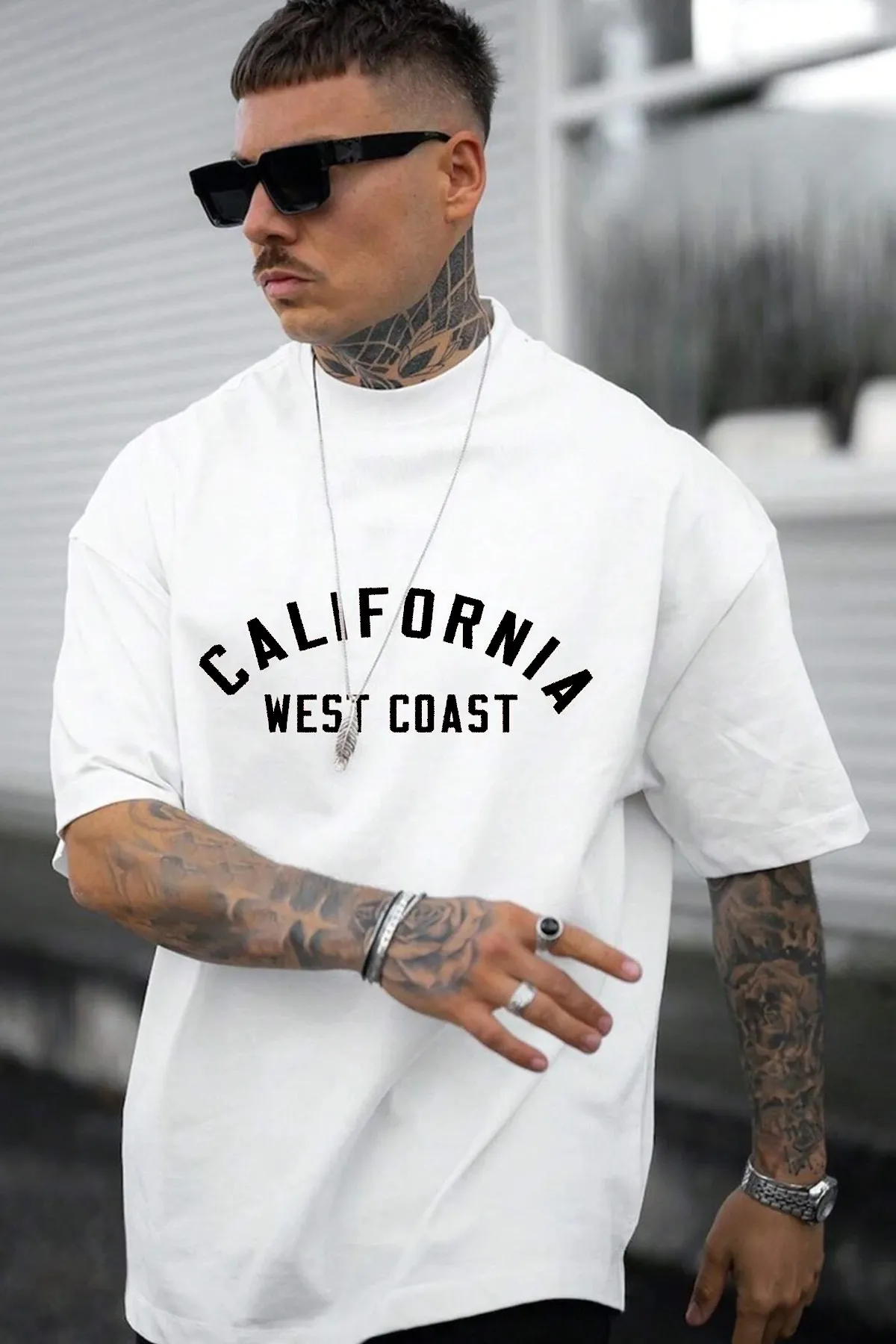 uyguntarz  Unisex-Übergroßes T-Shirt mit West Coast-Print