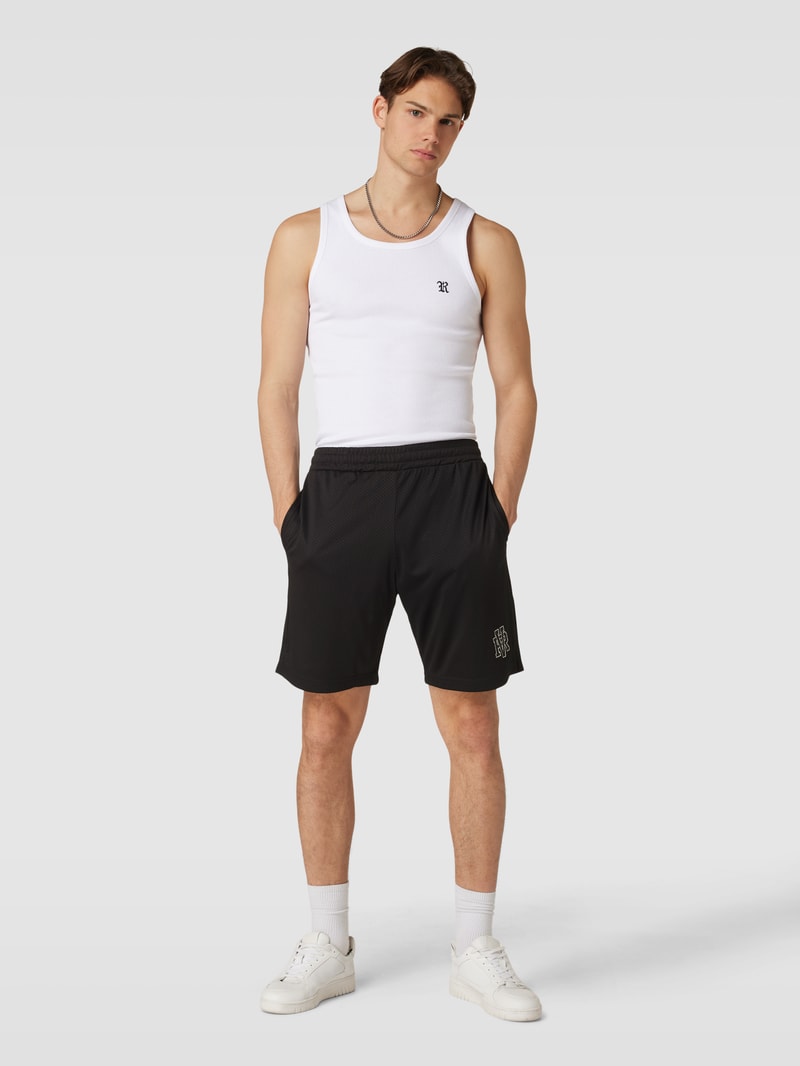 Shorts mit Camouflage-Muster in schwarz