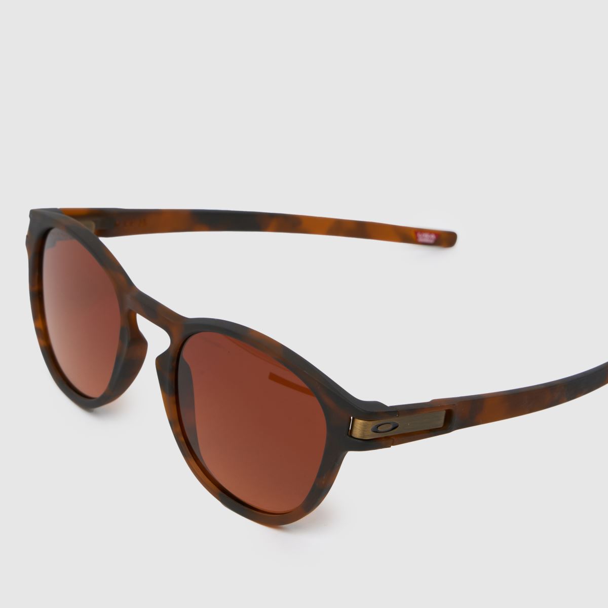 Oakley bruna solglasögon med spärr