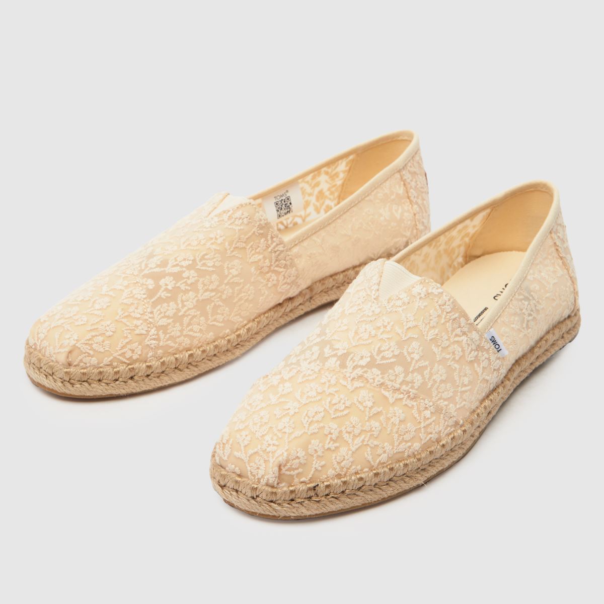 TOMS – Alpargata – Naturfärgade platta skor med blommig spets