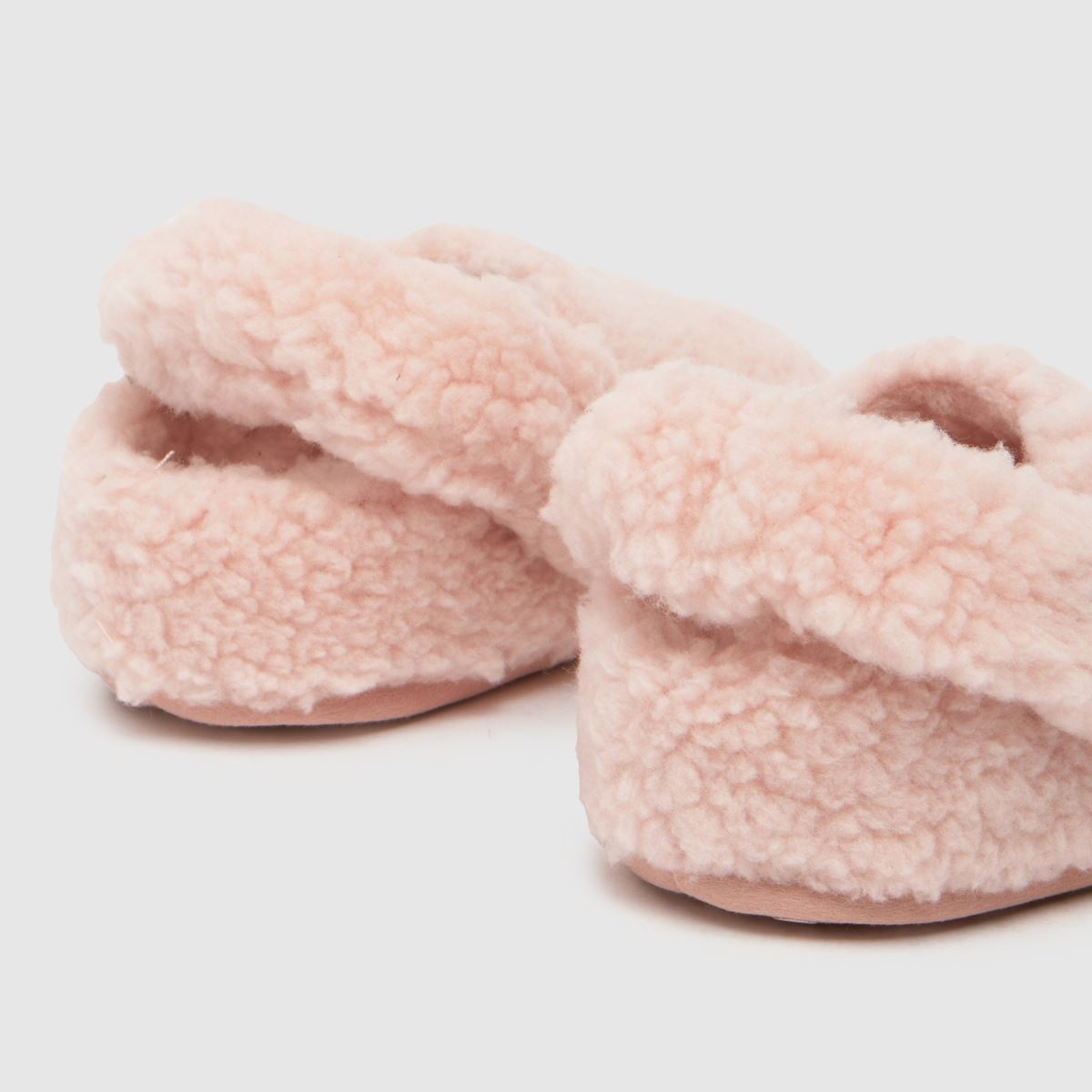 Crocs ljusrosa klassiska Cozzy flicktofflor för småbarn