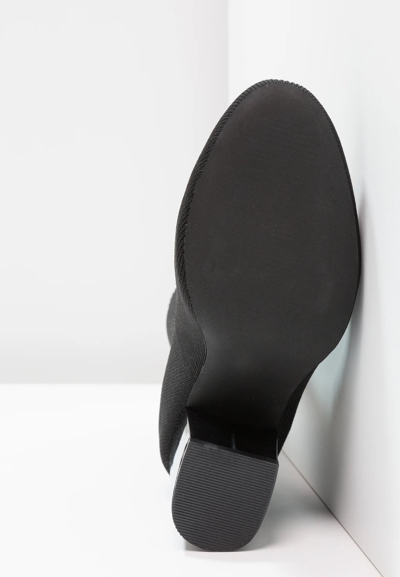 Botines de tacón par e impar