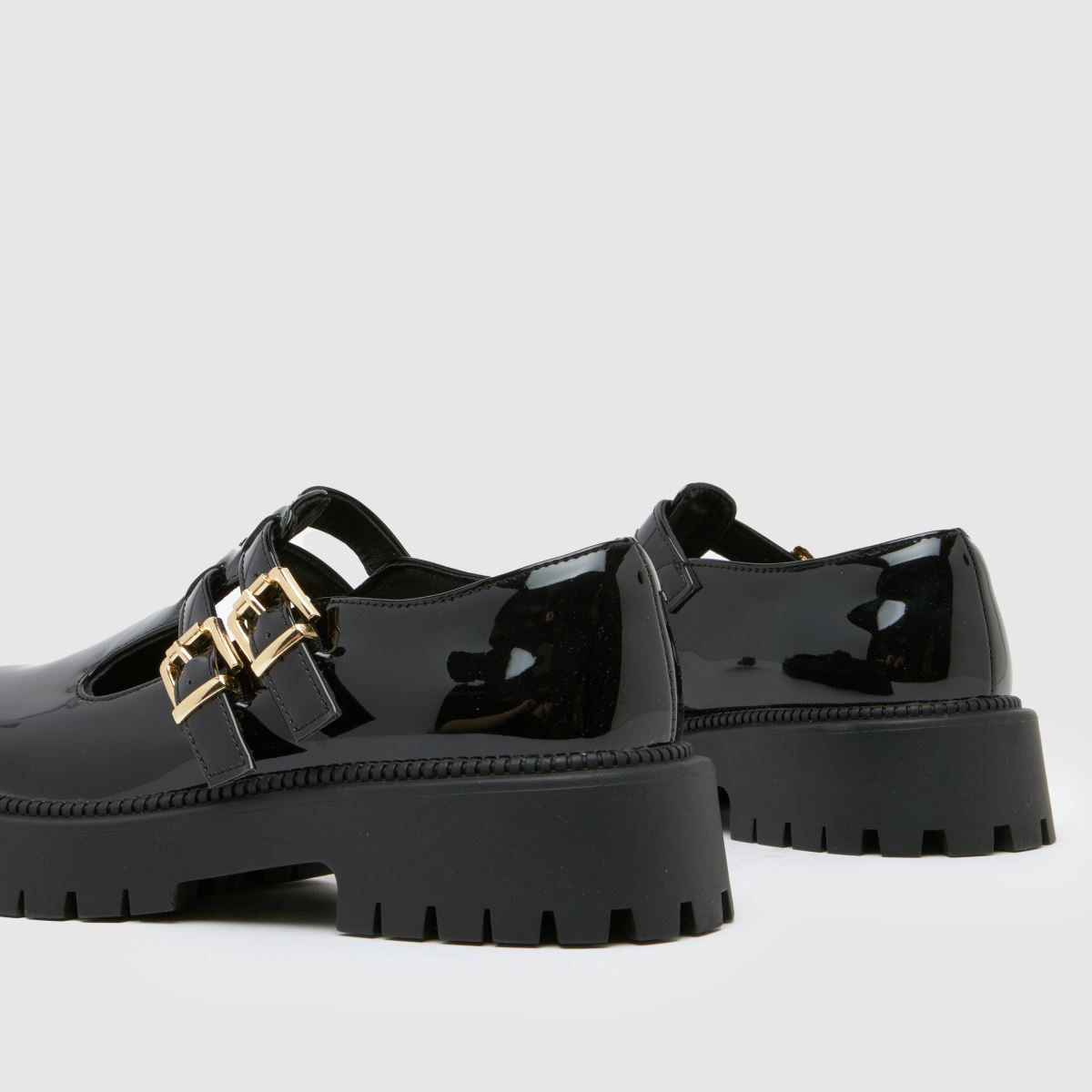 Schuh – Svarta platta skor med bred passform och lucette-rem