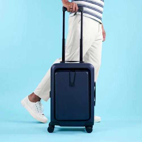 CDG 4-wheel hard-shell suitcase, plain navy blue pouch