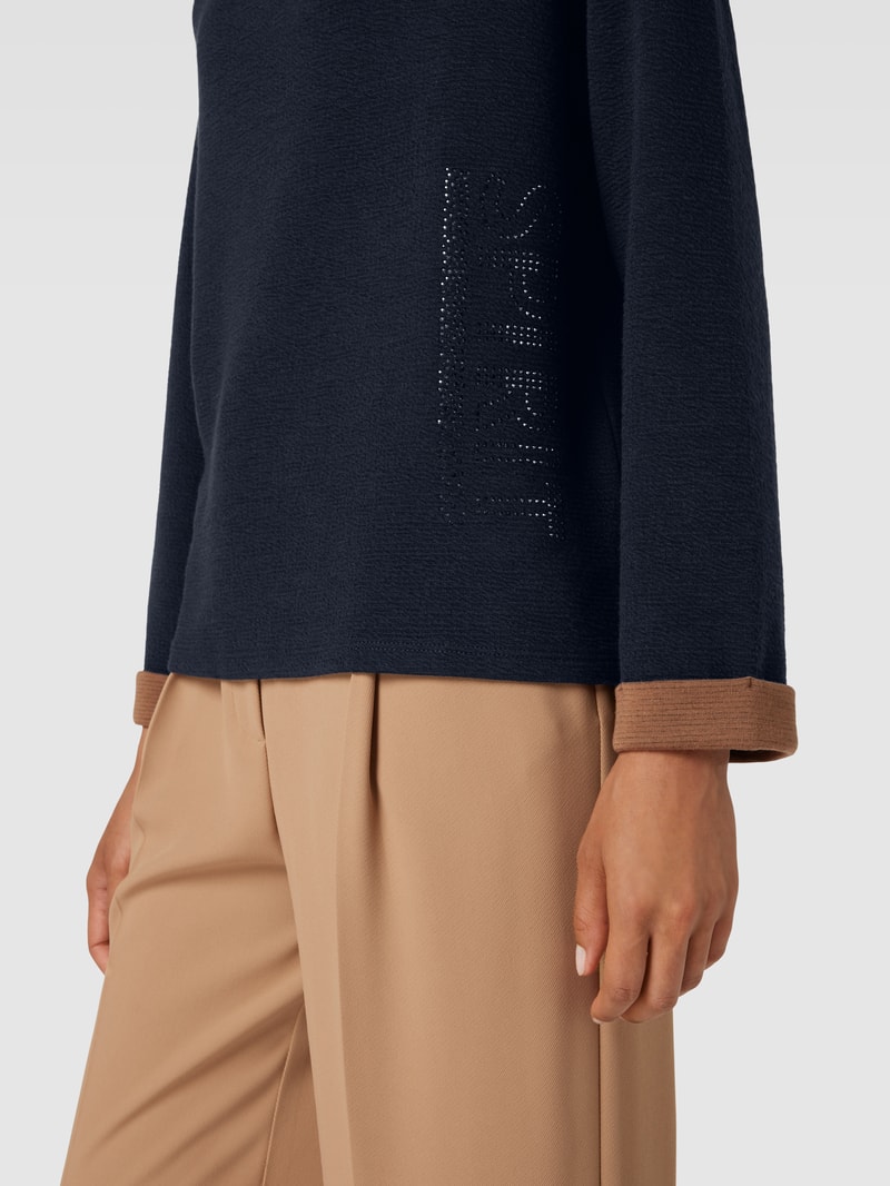 Pullover mit Ziersteinbesatz in marineblau