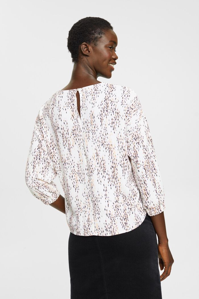 Gemusterte Bluse mit Cut-Out-Detail