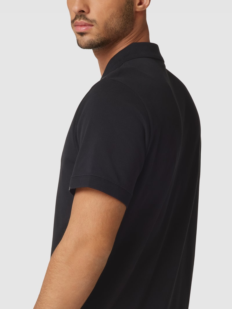 Poloshirt mit Knopfleiste und Logo-Detail in schwarz