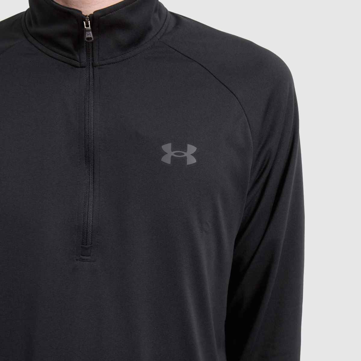 Under Armour – Svarta tech-tröjor med 1/2 dragkedja och ventilation