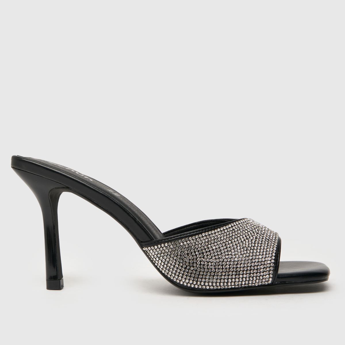 Schuh – Svarta högklackade muleskor med sherryutsmyckning