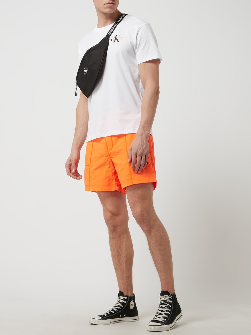 Shorts mit Meshfutter in neon orange