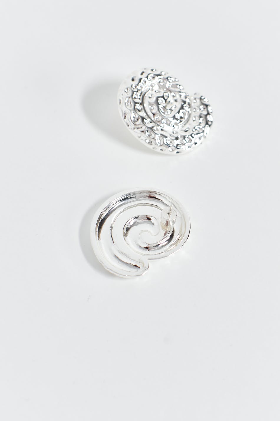 Crinkled silver spiral earrings