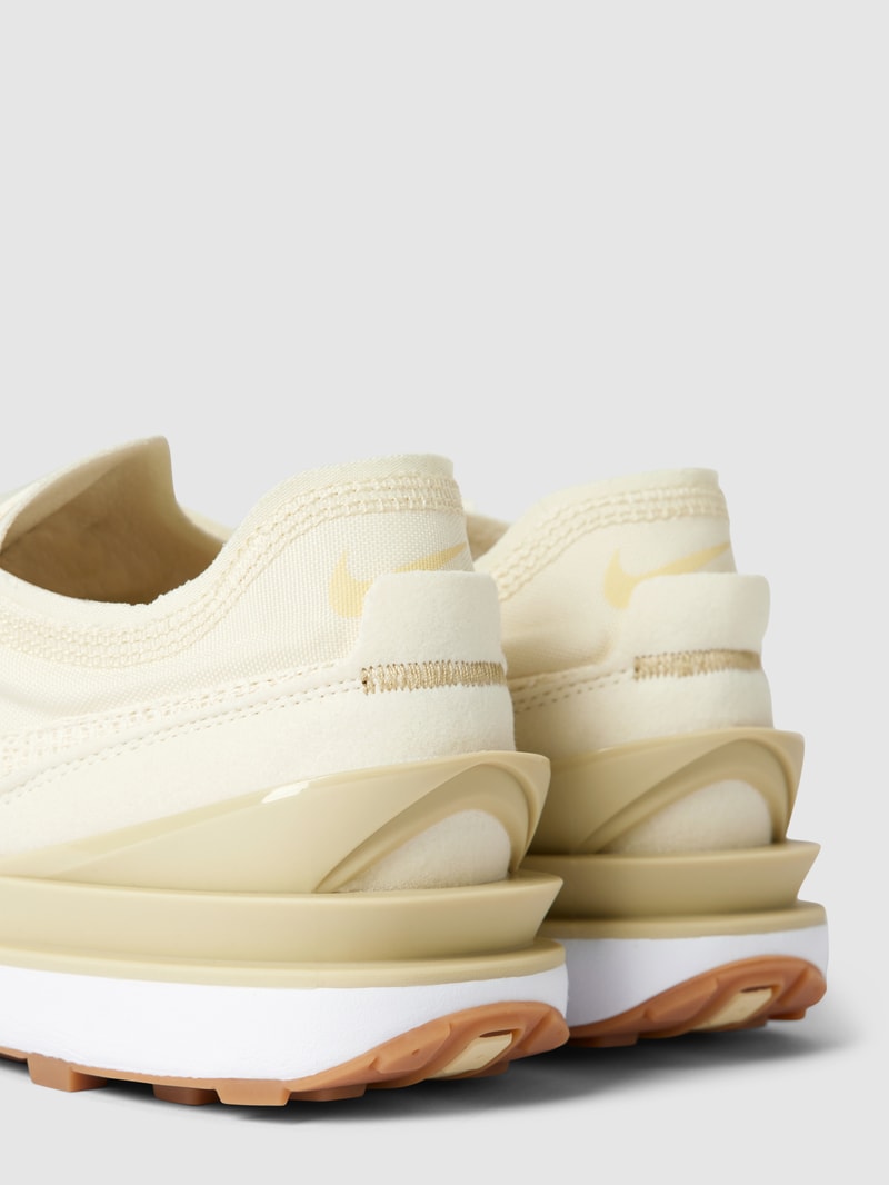 Sneaker mit Label-Details in hellgelb