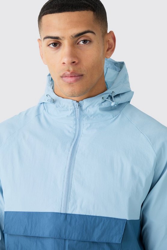 Colorblock Regenjacke mit Kapuze und halbem Reißverschluss