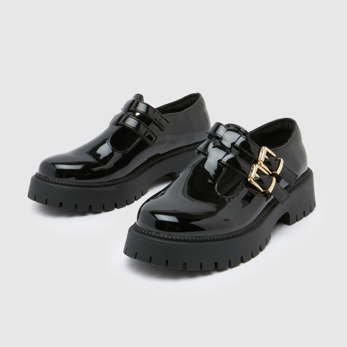 Schuh – Svarta platta skor med bred passform och lucette-rem