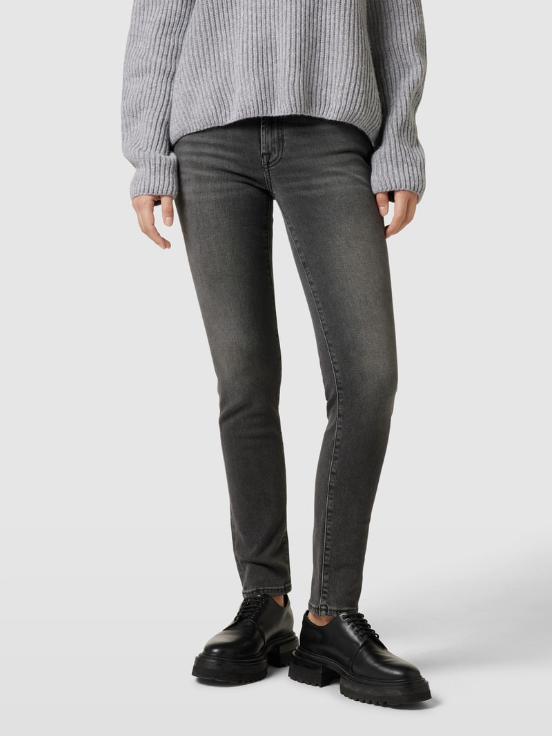 Jeans in unifarbenem Design Modell 'Roxanne' in schwarz