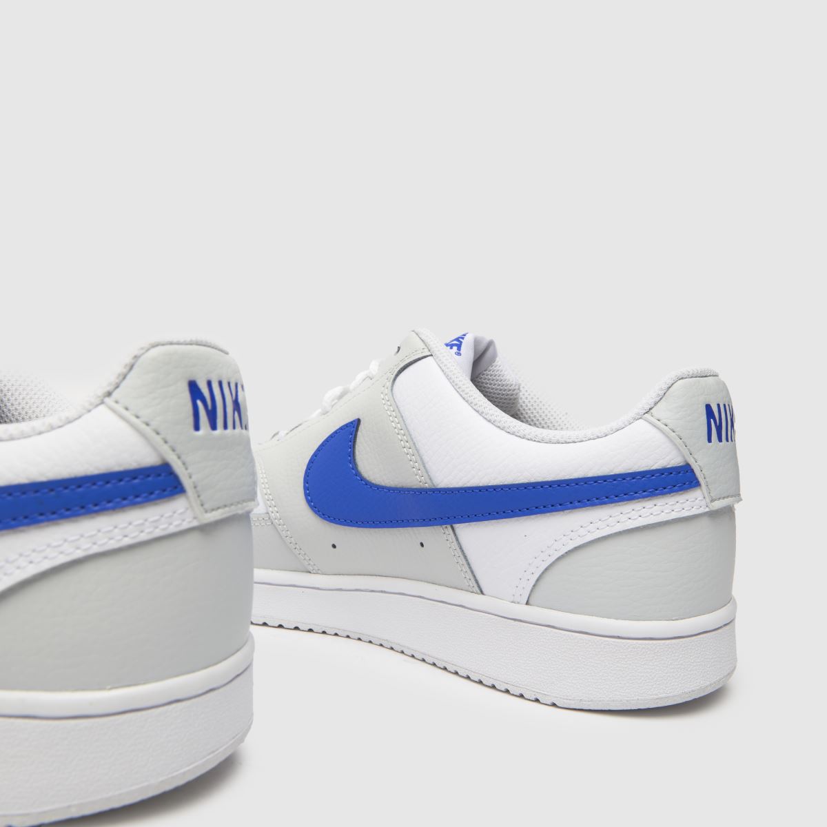 Športni copati Nike Court Vision v beli in modri barvi