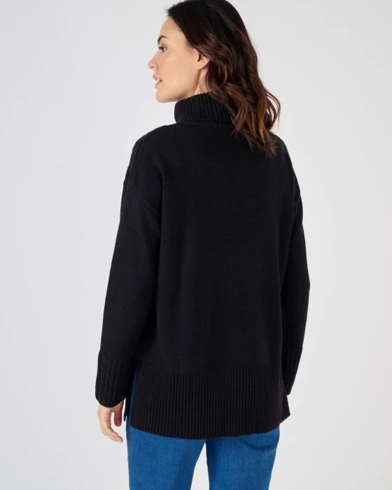 Pull col roulé à torsades