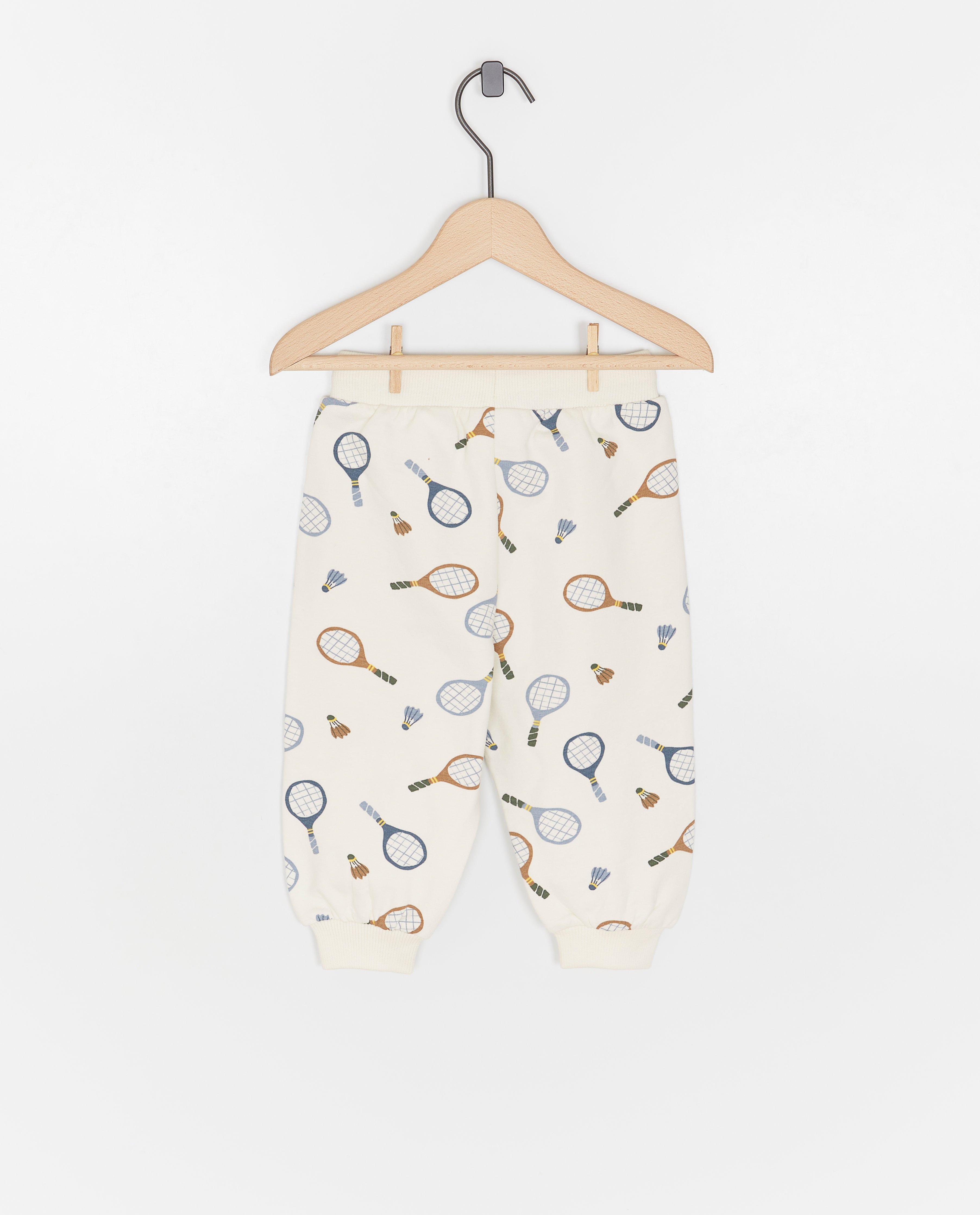 Pantaloni de trening Cuddles and Smiles cu imprimeu de rachete, albi