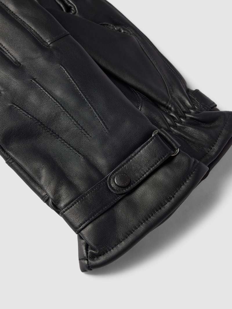 Lederhandschuhe mit verstellbarem Riegel Modell 'Burnished' in schwarz
