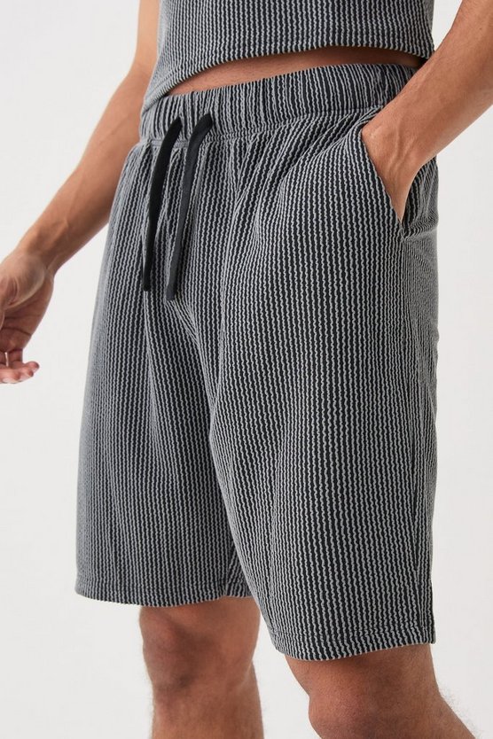 Lockere mittellange strukturierte Shorts mit Streifen