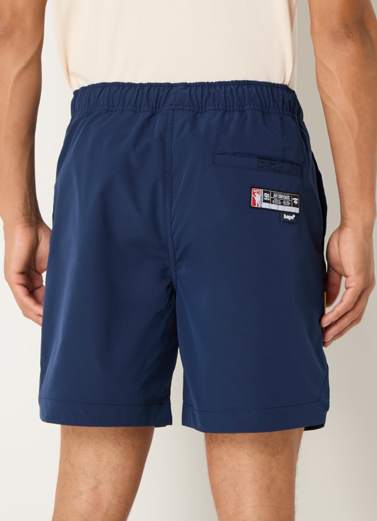 Pantaloni slim fit cu logo-ul Aape con