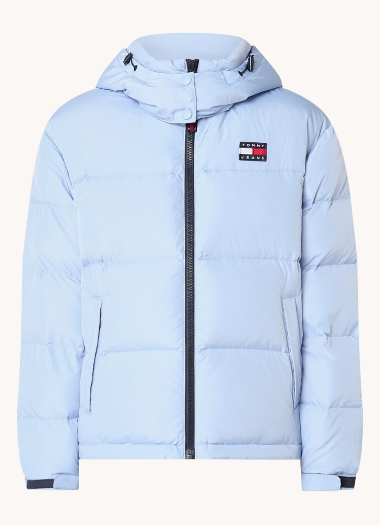 Prošívaná bunda Tommy Hilfiger s péřovou výplní a kapsami na zip
