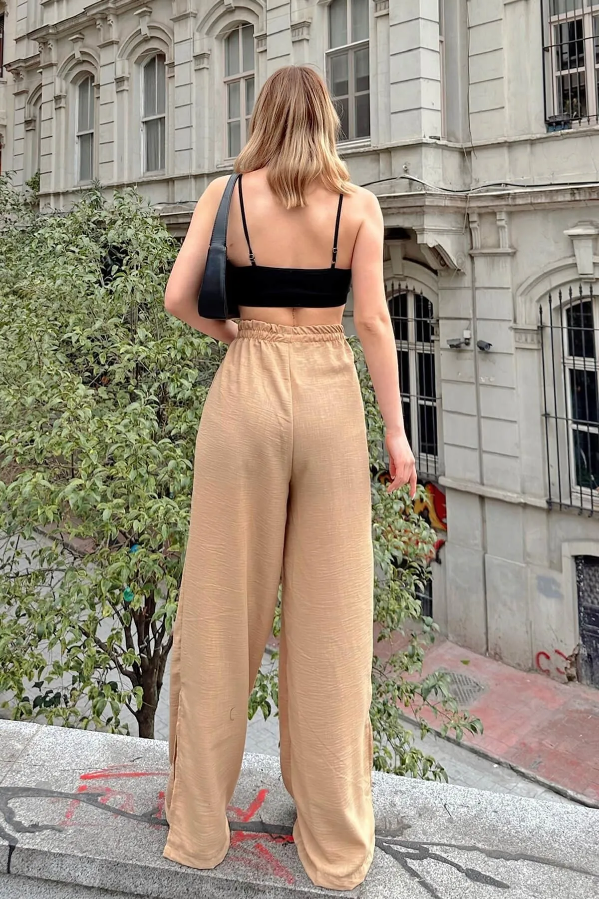 Swist  Mink Lure Ayrobin-Jogginghose für Damen mit hoher Taille und geschlitzten Beinen