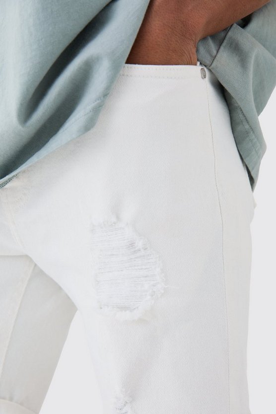 Weiße Skinny Stretch Jeansshorts mit Rissen