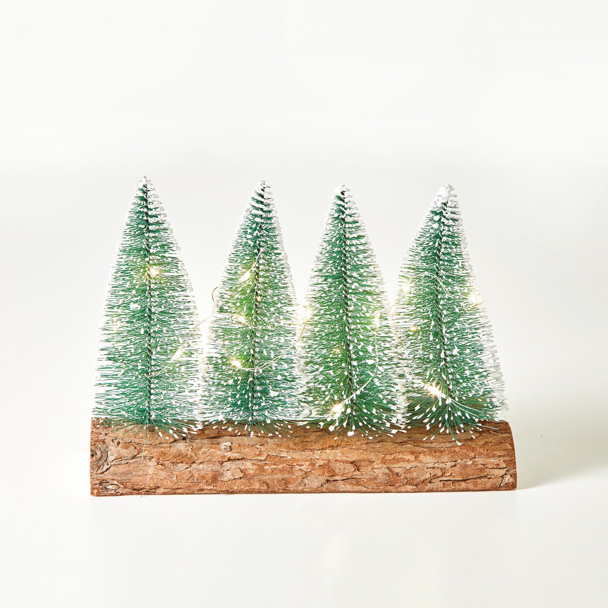 Sapins lumineux sur support bois