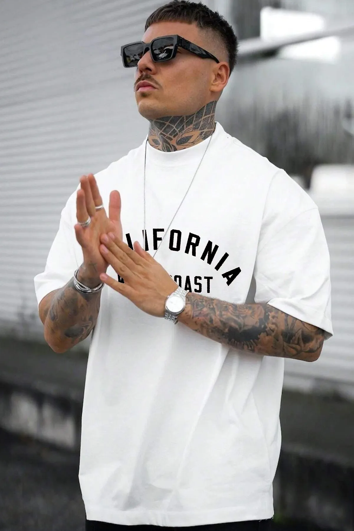 uyguntarz  Unisex-Übergroßes T-Shirt mit West Coast-Print