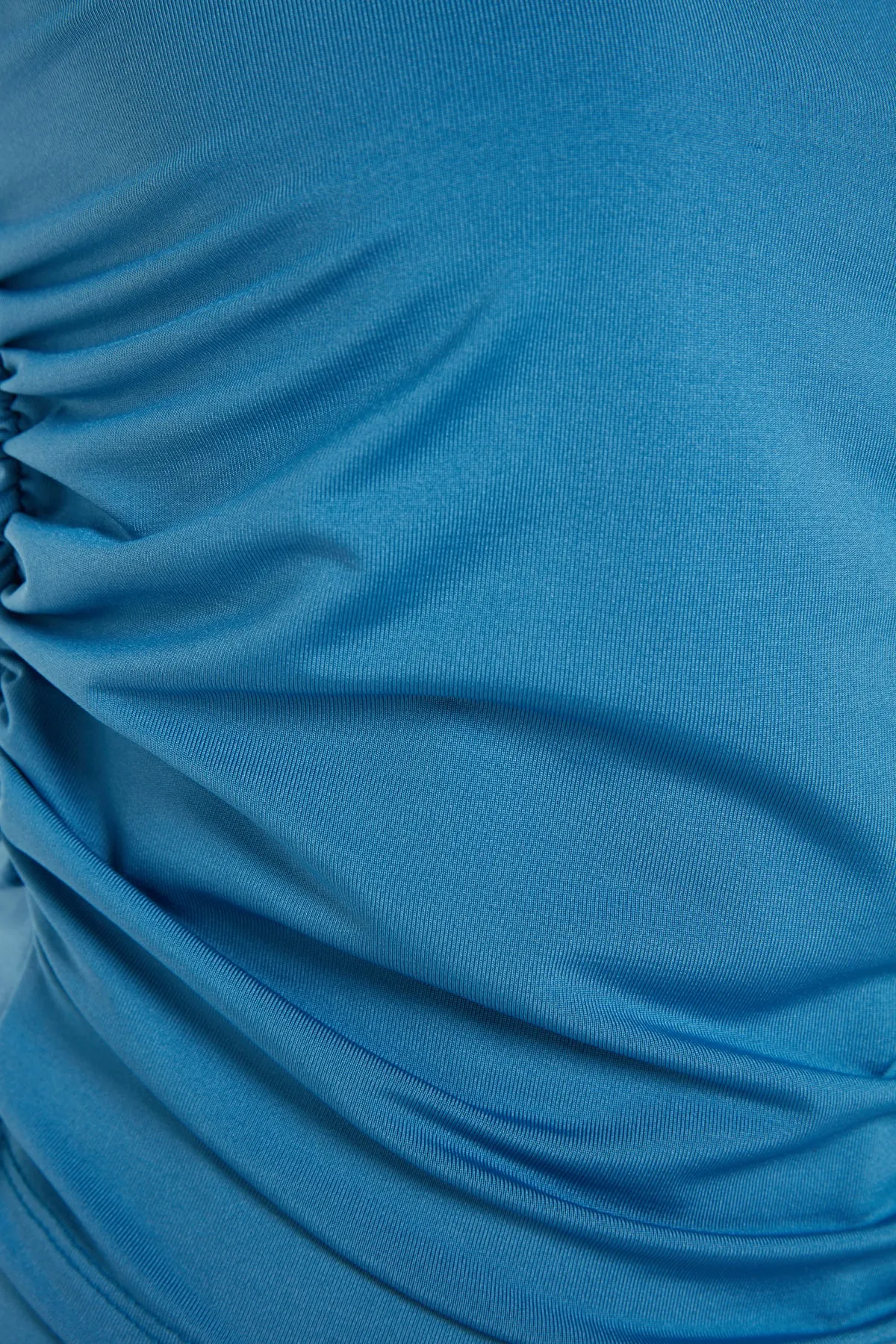 Trendyol Collection  Indigoblaues Set aus Oberteil und Unterteil mit einschultriger Schulterpartie und Kordelzug und ausgestelltem Bein aus Strick TWOSS23AU00037