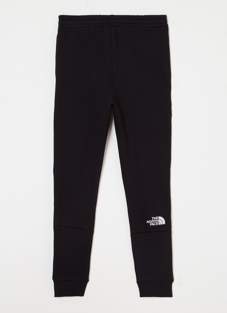Pantaloni de trening slim fit de la The North Face, cu logo brodat.