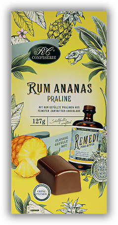 RC Confiserie Rum Ananas Praline flüssig gefüllt mit Remedy Pineapple 127g RC Confiserie Rum Ananas Praline flüssig gefüllt mit Remedy Pineapple 127g The Tropical Treasure. 127	 Gramm