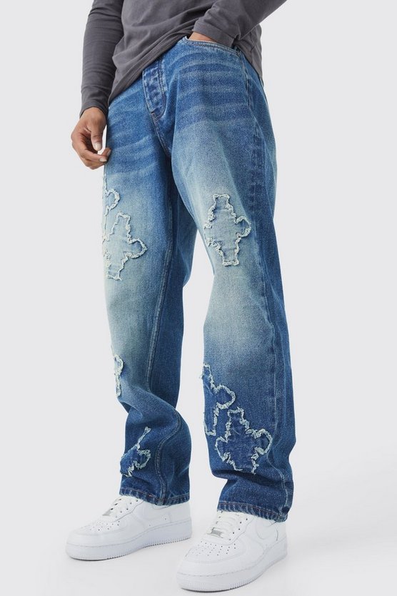 Lockere Jeans mit rohem Saum und Kreuz-Applikation