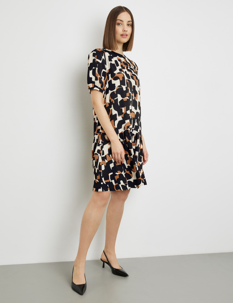 Kleid mit Puffärmeln und Volant