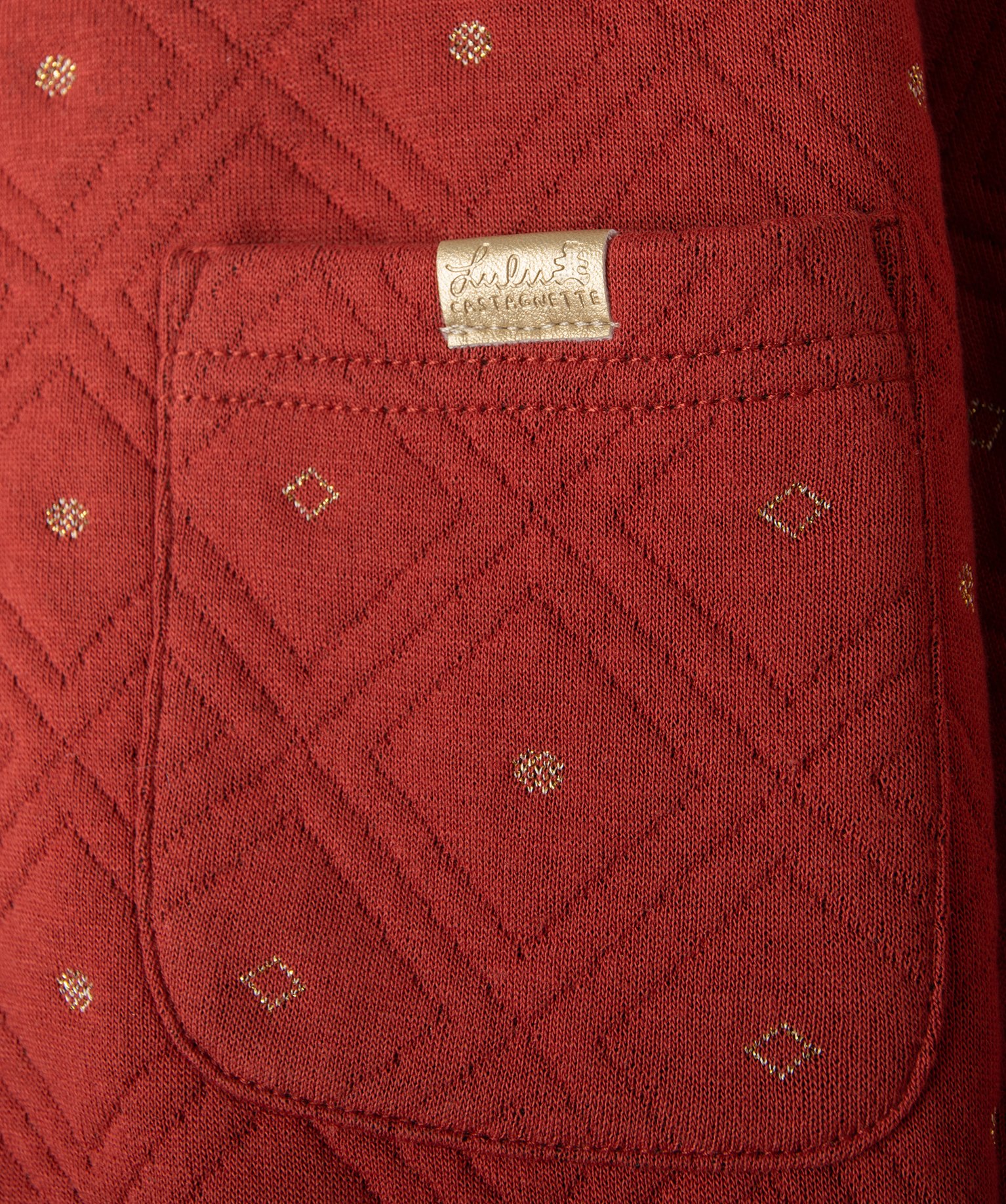 Veste fille à matelassage géométrique et détails dorés ... rouge fonce | GEMO