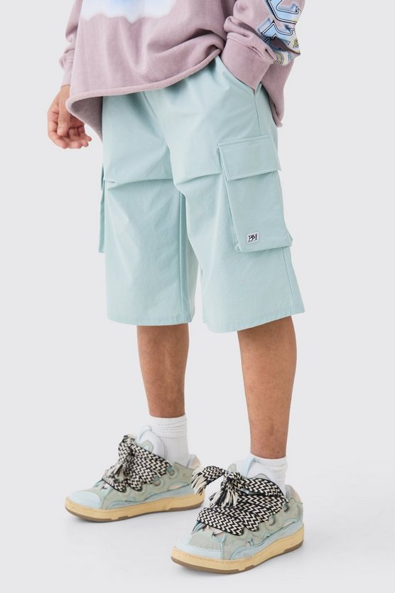 Lockere elastische Stretch-Shorts mit Logo