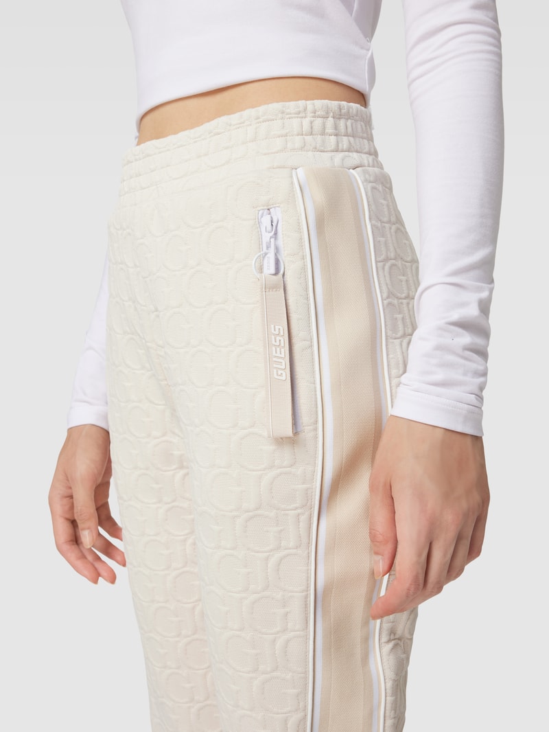 Sweatpants mit Allover-Logo Modell 'DARLA' in sand