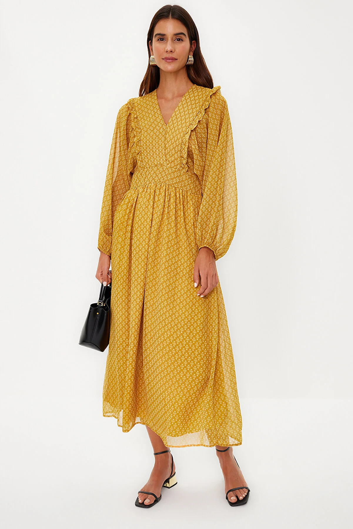 Trendyol Modest  Senfgelbes, minimal gemustertes, mit Chiffon gefüttertes Webkleid TCTSS24EB00035
