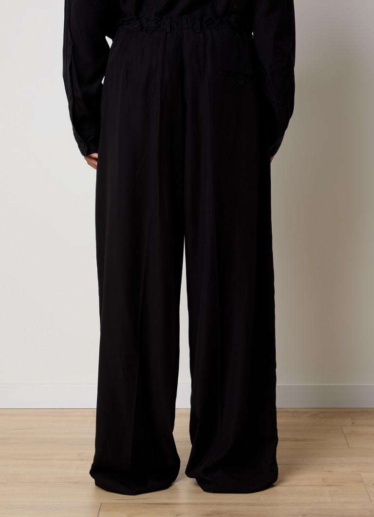 Pantaloni Balenciaga din lyocell cu croi larg și buzunare laterale