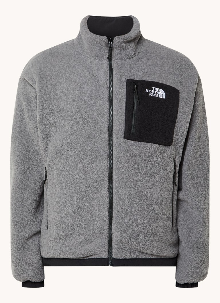 Reverzibilna jakna The North Face Yumiori s džepovima na patentni zatvarač i vezom logotipa