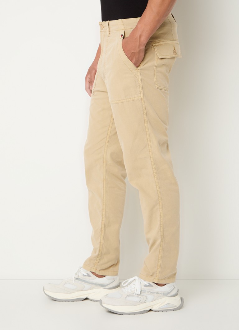 Chino nohavice Tommy Hilfiger Isaac zúženého strihu s prešívanými vreckami
