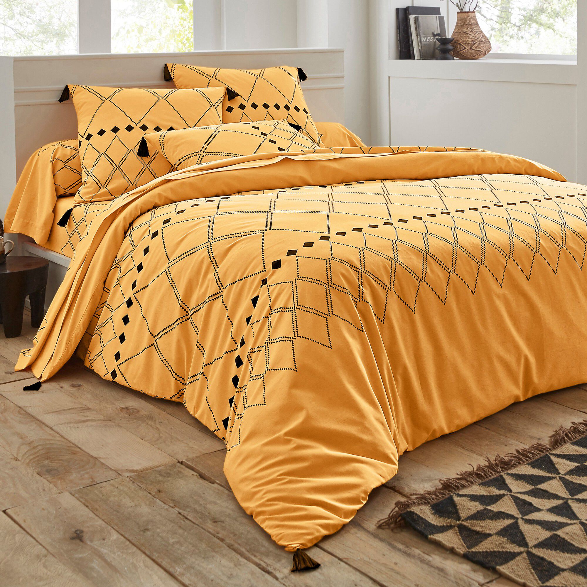 Linge de lit Massaï coton à motifs graphiques et finitions pompons