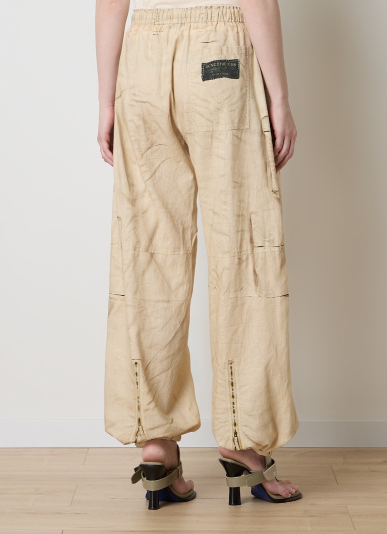 Pantaloni cargo a vita media e affusolati di Acne Studios in misto lino.