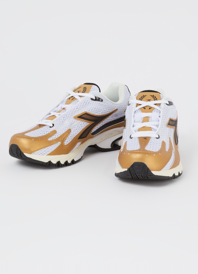 Buty sportowe Diadora Mythos Propulsion 280 z siateczkowymi detalami