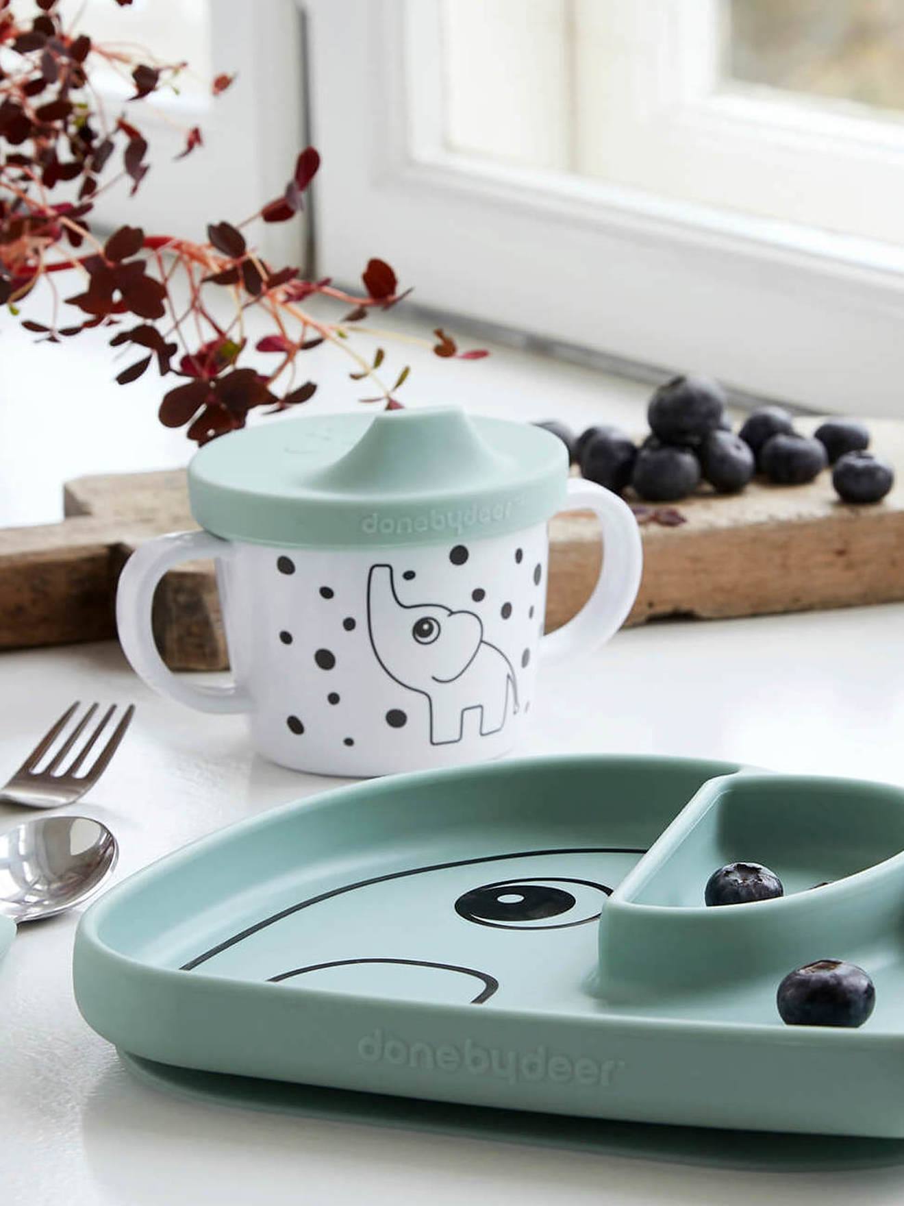 Assiette DONE BY DEER Stick&Stay Elephant en silicone jaune moutarde