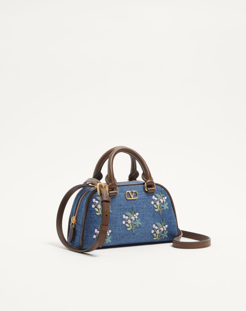 Valentino Garavani VLogo Signature Mini Boston Bag em jeans com bordado floral