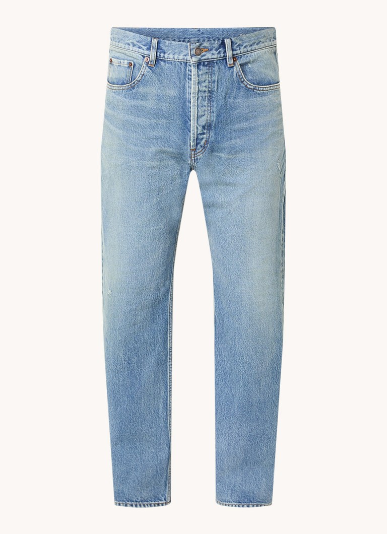 Jeansy Saint Laurent z prostymi nogawkami, lekko wyblakłe.