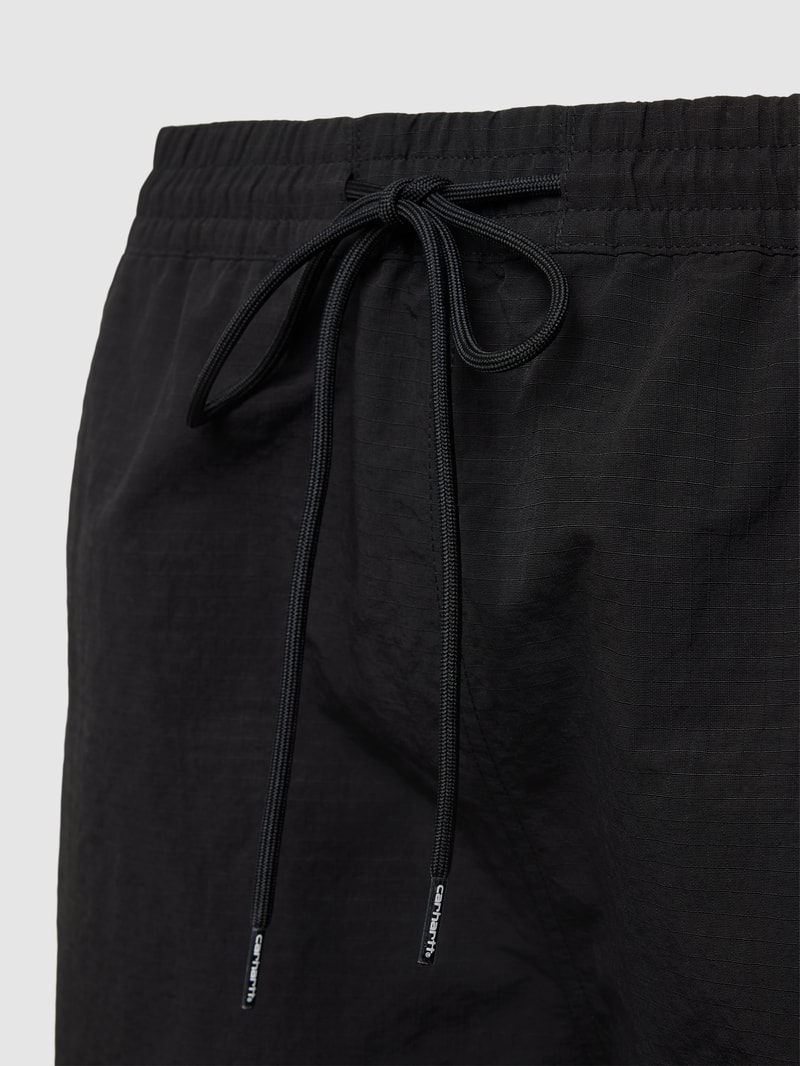 Badehose mit Label-Patch Modell 'RUNE' in schwarz