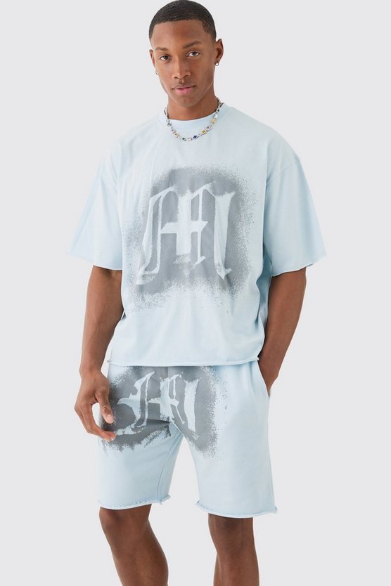 Kastiges Oversize T-Shirt mit Graffiti-Print und rohem Saum